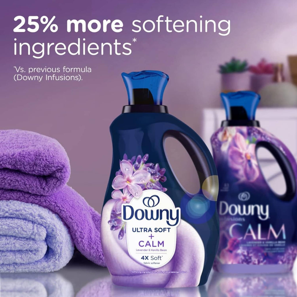 Downy Ultra Soft fabric softener bottles with plush purple towels