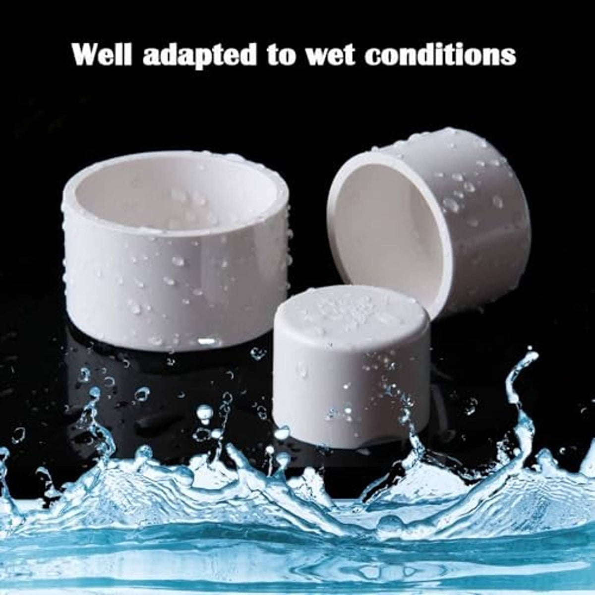 White PVC pipe end caps with water droplets, closed flat ends visible