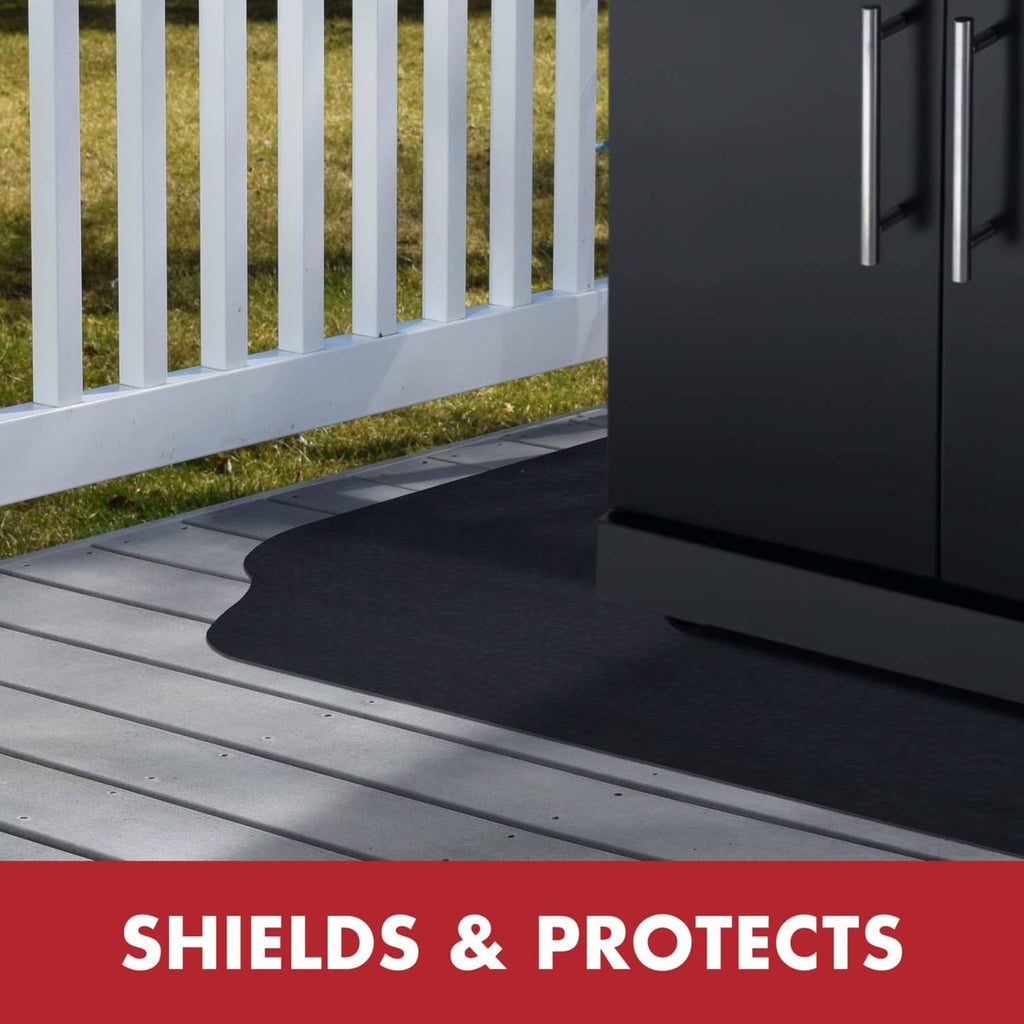 Black rubber protective grill deck mat under a patio grill on outdoor decking