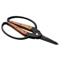 Garden shears with black metal and wooden handles, curved finger rings and pointed blades.