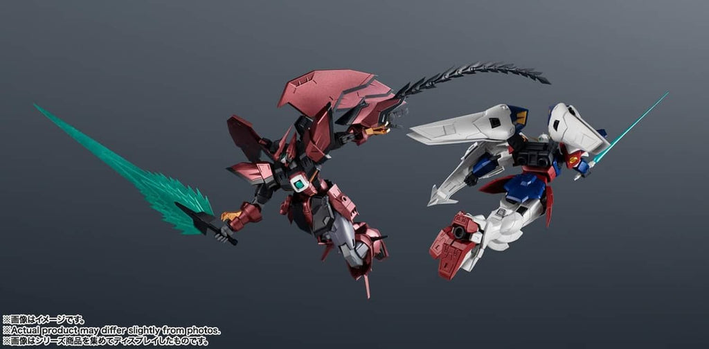 TAMASHII NATIONS Gundam action figures with teal beam effects, red and white mecha