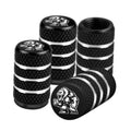 Set of 4 black textured tire valve stem caps with Yeti logo and silver stripe bands