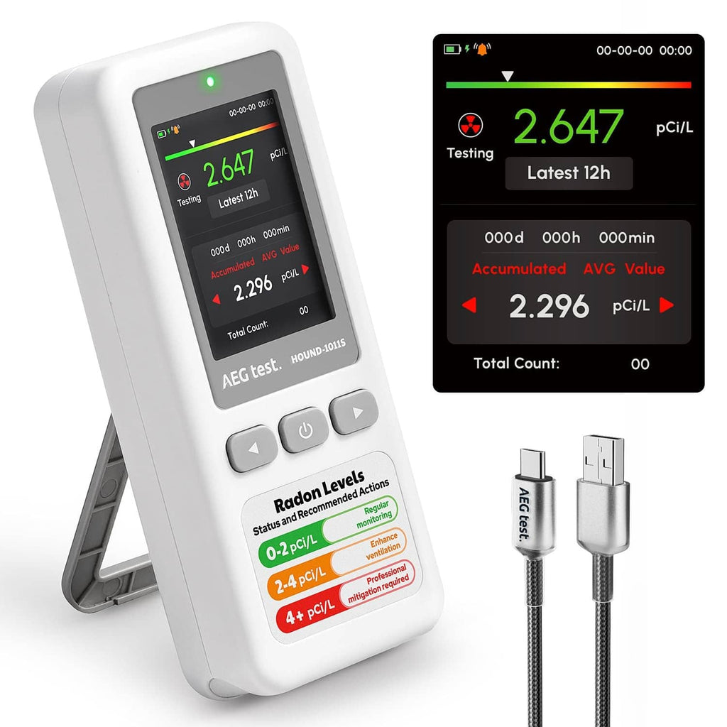White portable radon detector with LCD display and two USB cables