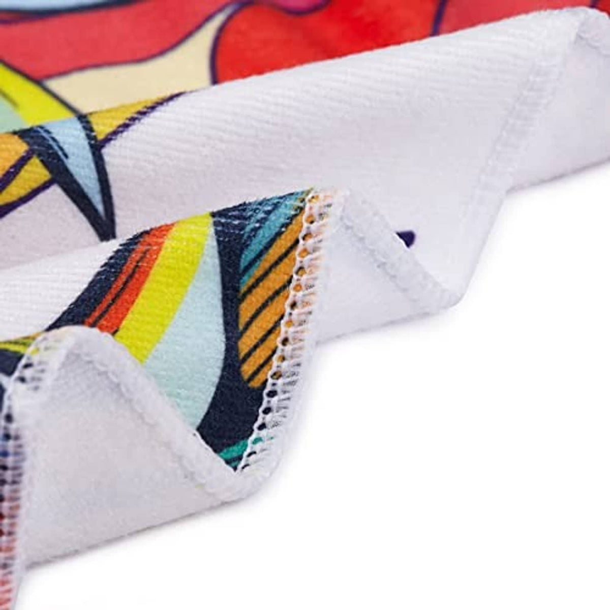 Golf cart seat cover edge with white stitched trim and colorful printed fabric
