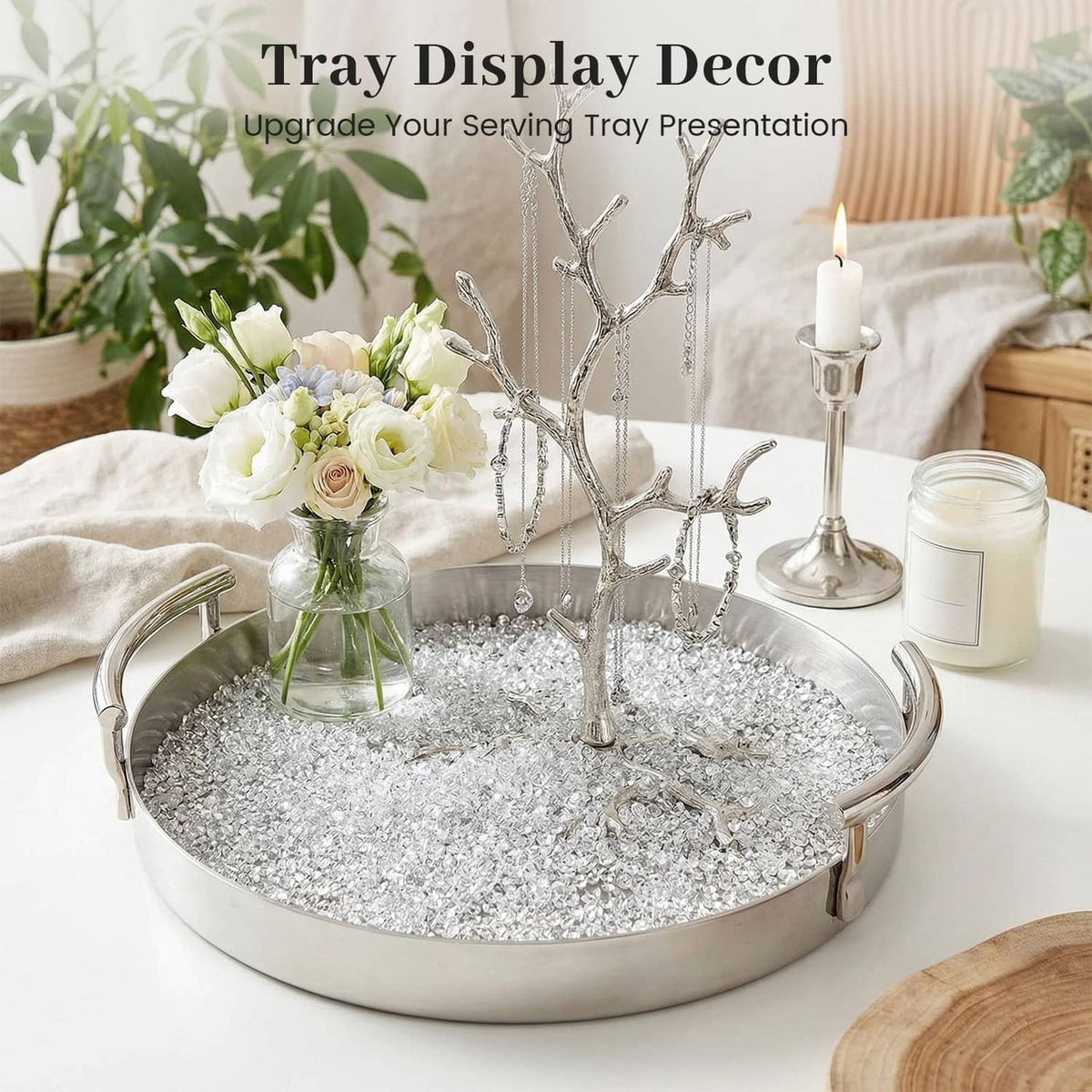 Clear faux rhinestone beads layered on a metal tray for centerpiece decor