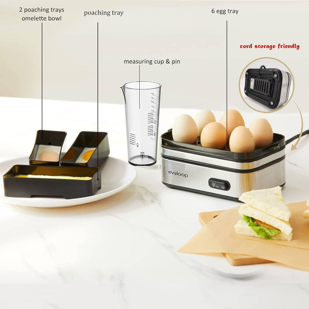 Electric egg cooker with six-egg tray, measuring cup, and poaching accessory