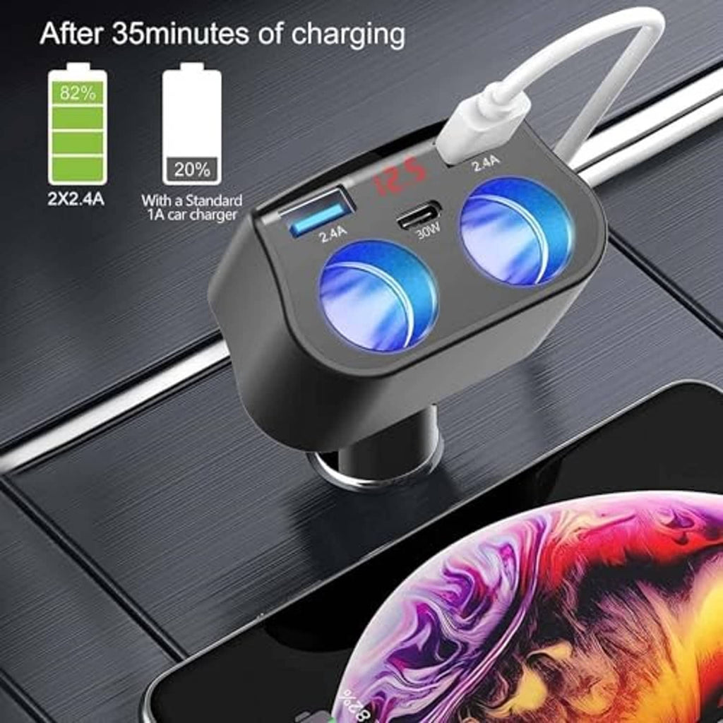 Car charger adapter plugged into a console, black with two blue LED-lit sockets