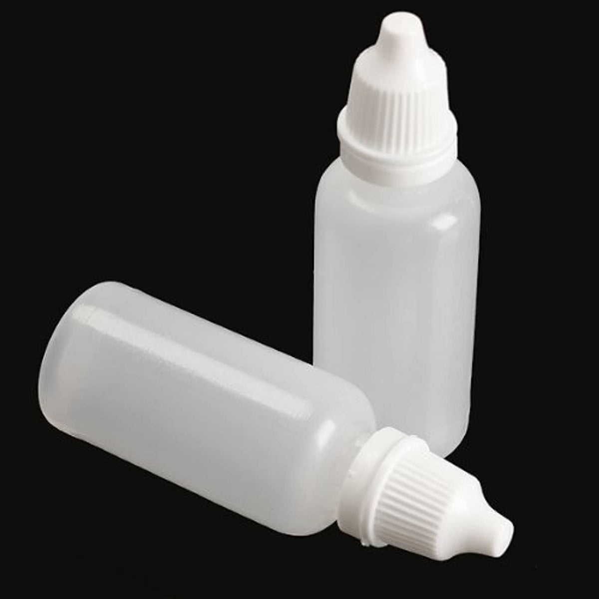 White squeezable plastic dropper bottle with dispensing tip and ribbed cap