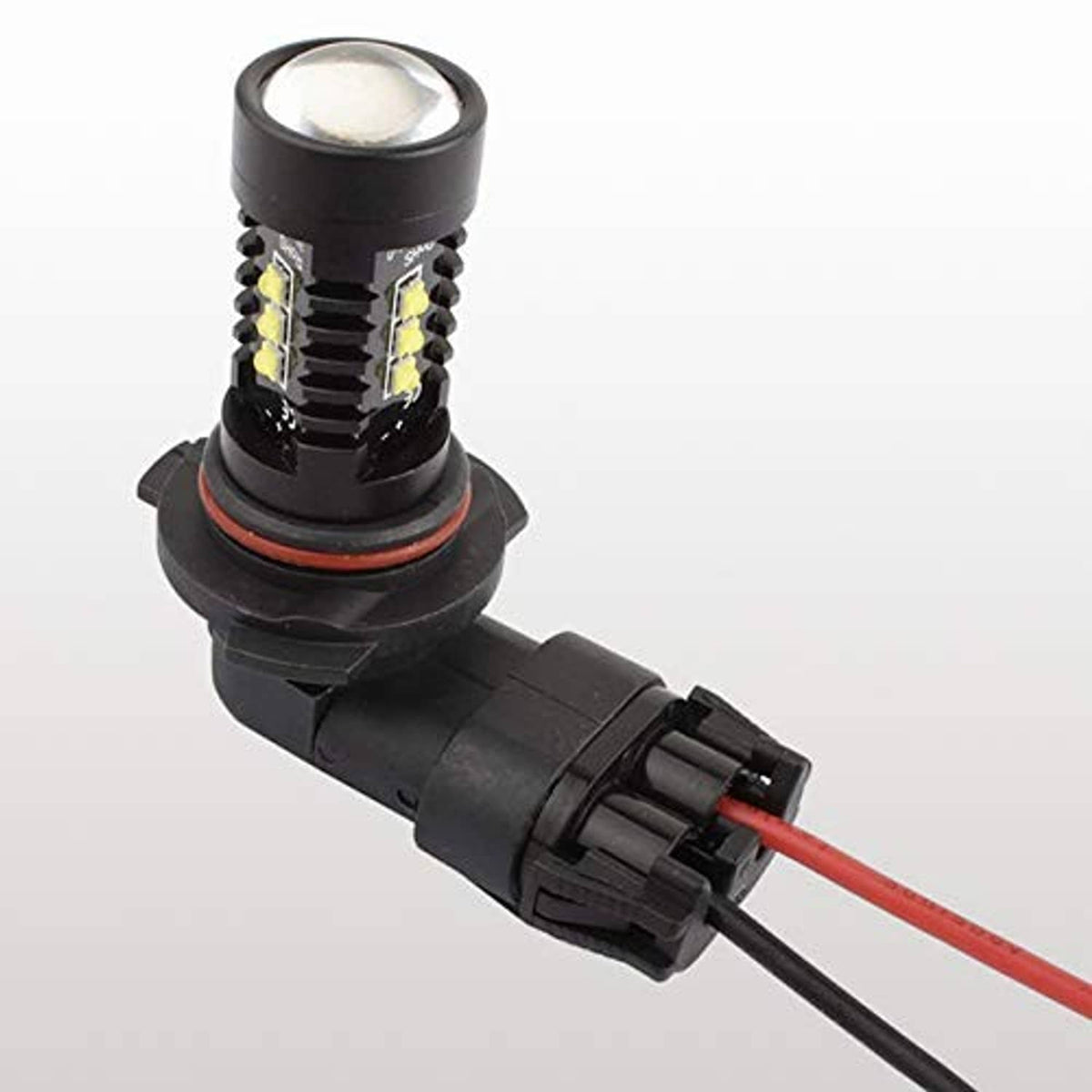 Headlight bulb-side connector with black housing and red/black wire leads