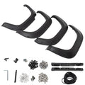 Set of black wheel fender flares with mounting hardware pieces and screws