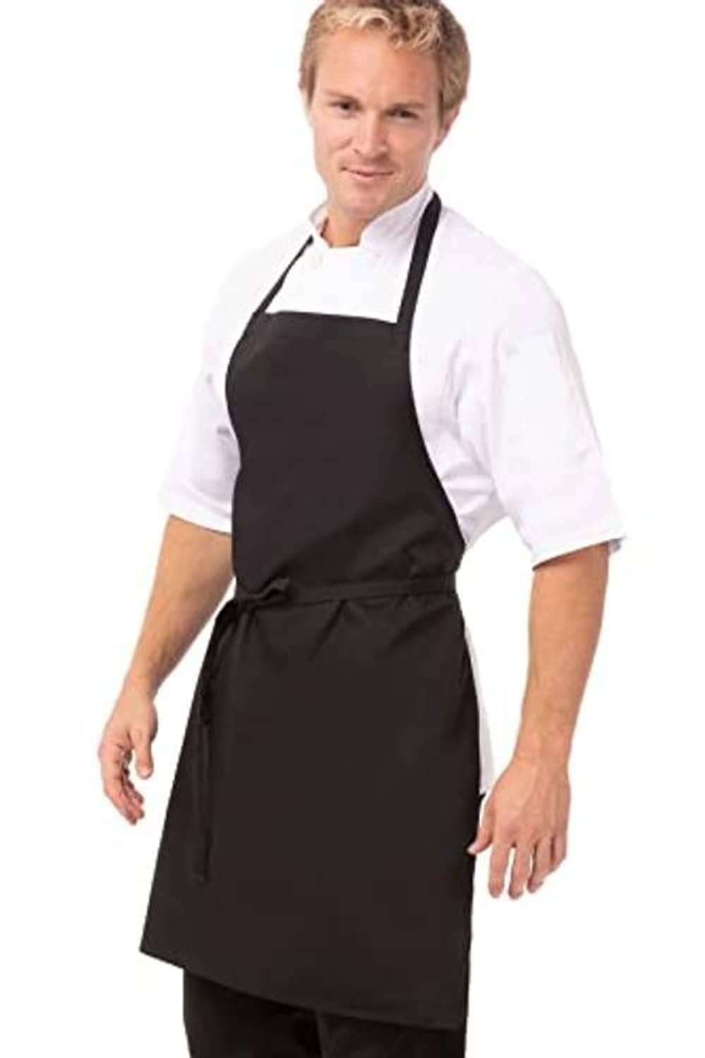 Black unisex apron on model, wide neck strap and waist ties with front pocket