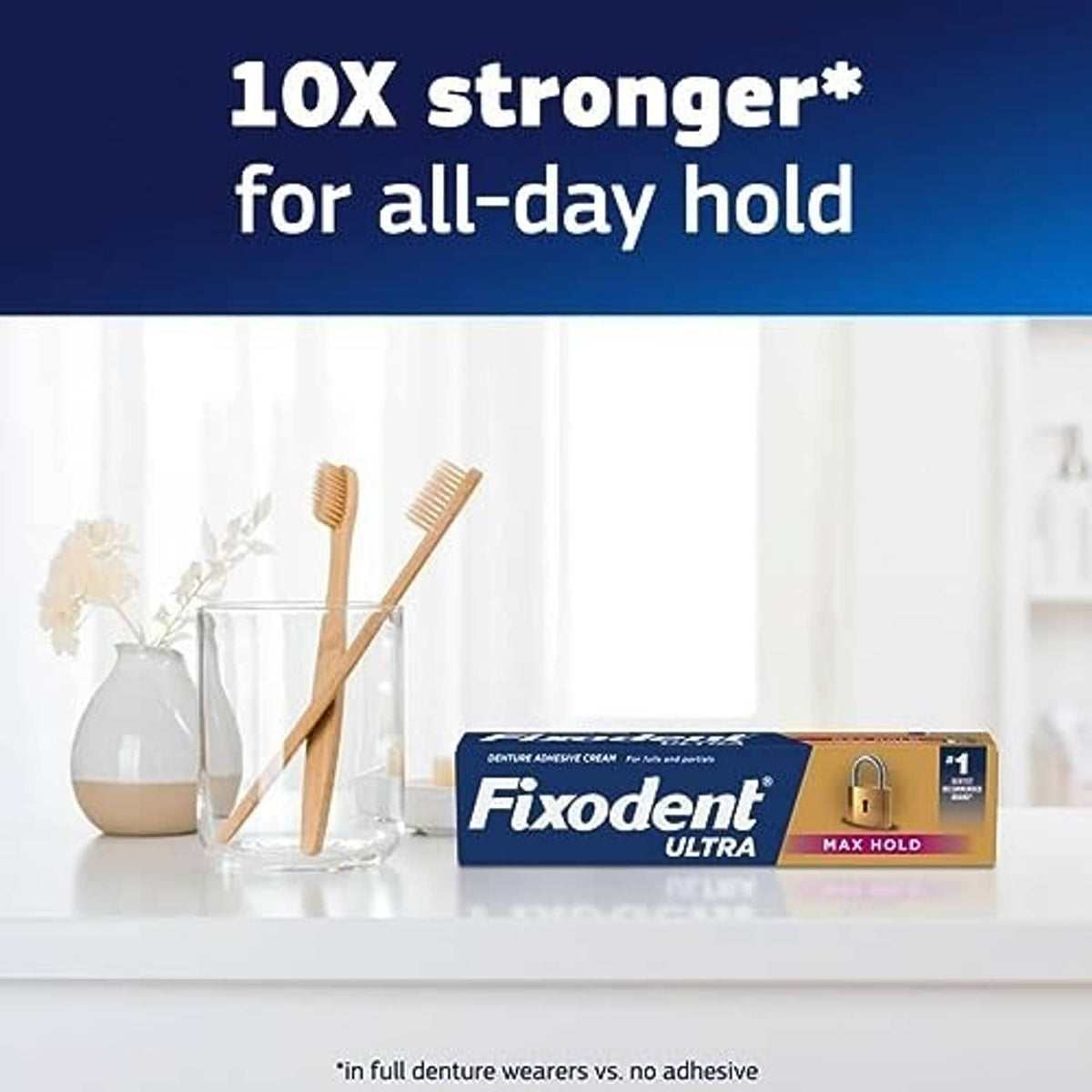 Fixodent Ultra max hold denture adhesive cream tube and box on countertop