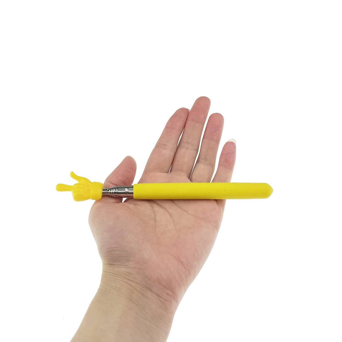 Yellow telescopic finger pointer in hand with finger-shaped top