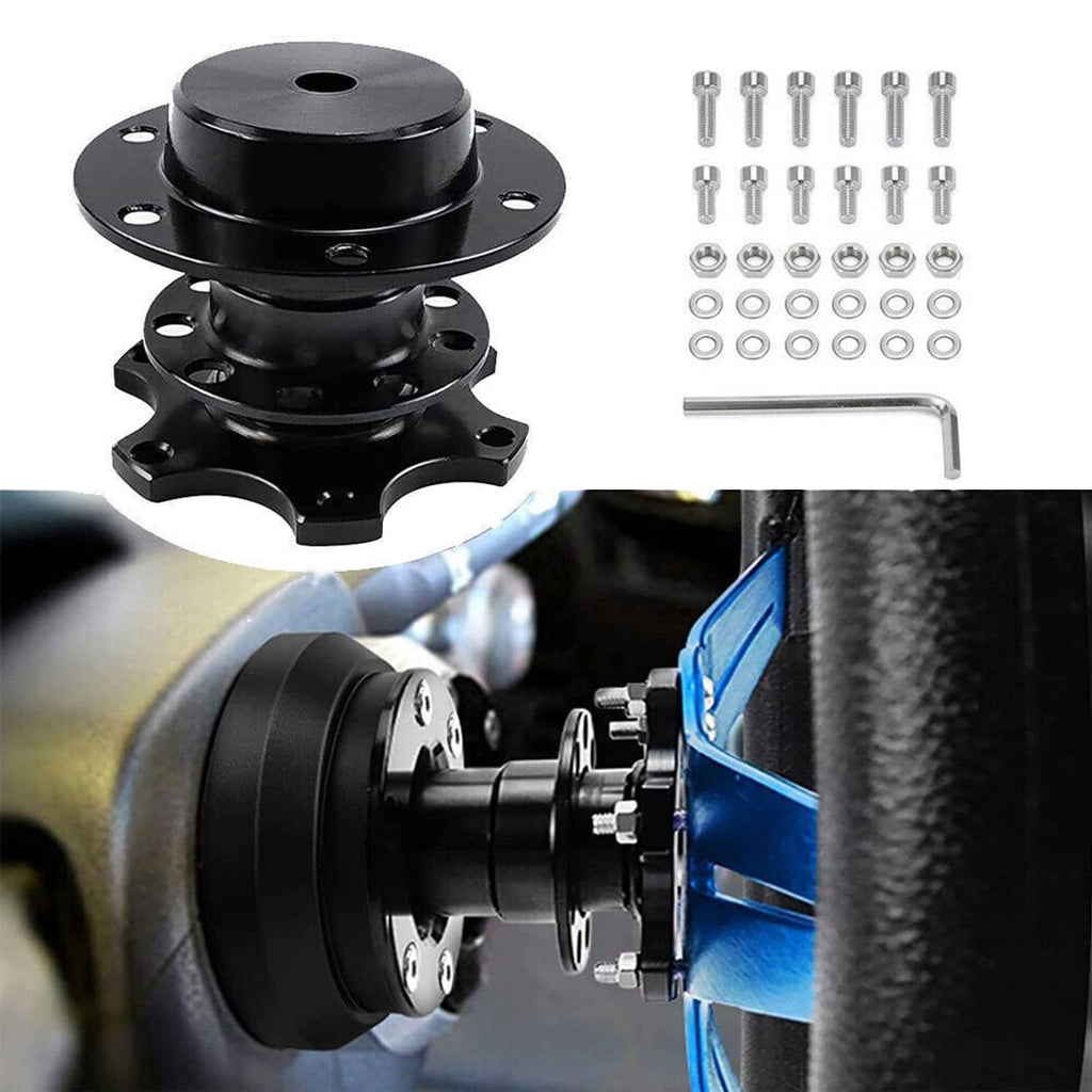 Black steering wheel quick release hub adapter with hardware, shown with installed view