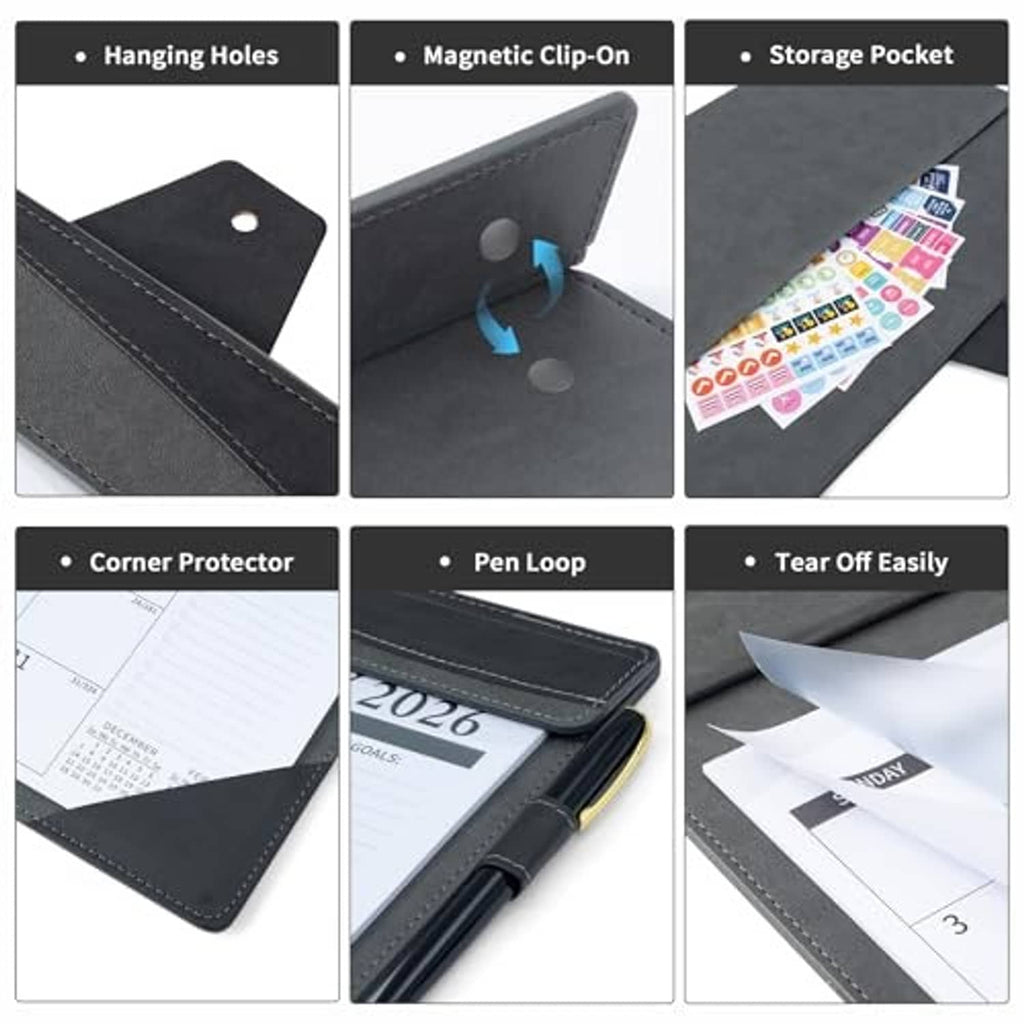 Black leather desk calendar close-up with corner protectors, pen loop, and storage pocket