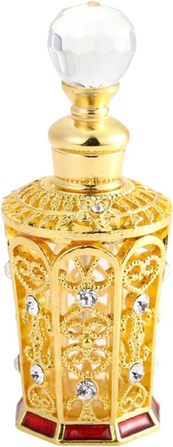 Golden ornate perfume bottle with faceted crystal cap and jeweled filigree design