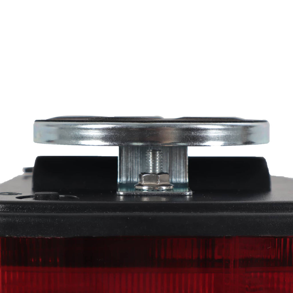 Magnetic trailer tail light with metal mounting post and red lens bottom
