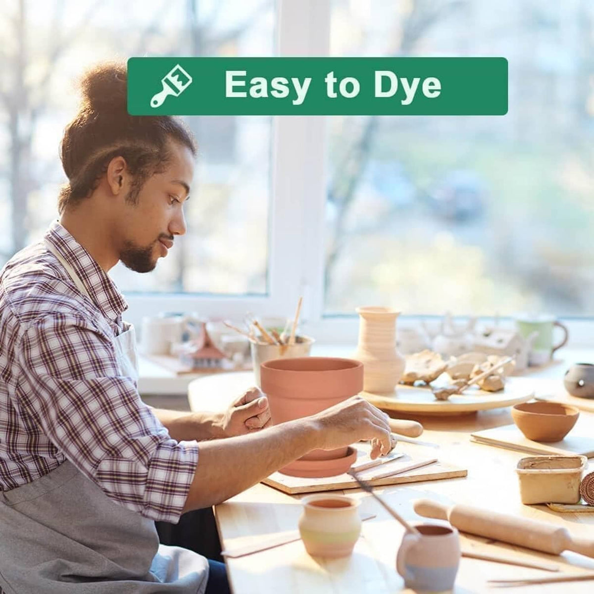 Terracotta plant pots on a table, for DIY dyeing