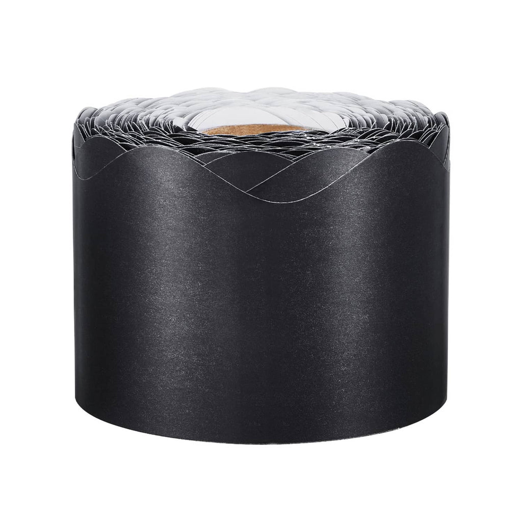 Black rolled scalloped border trim spool with white wire-like lines showing on top