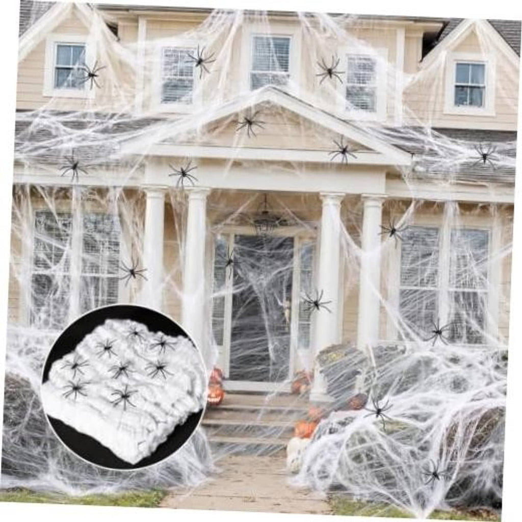 White spider web Halloween decoration with black webbed spiders on a house entrance