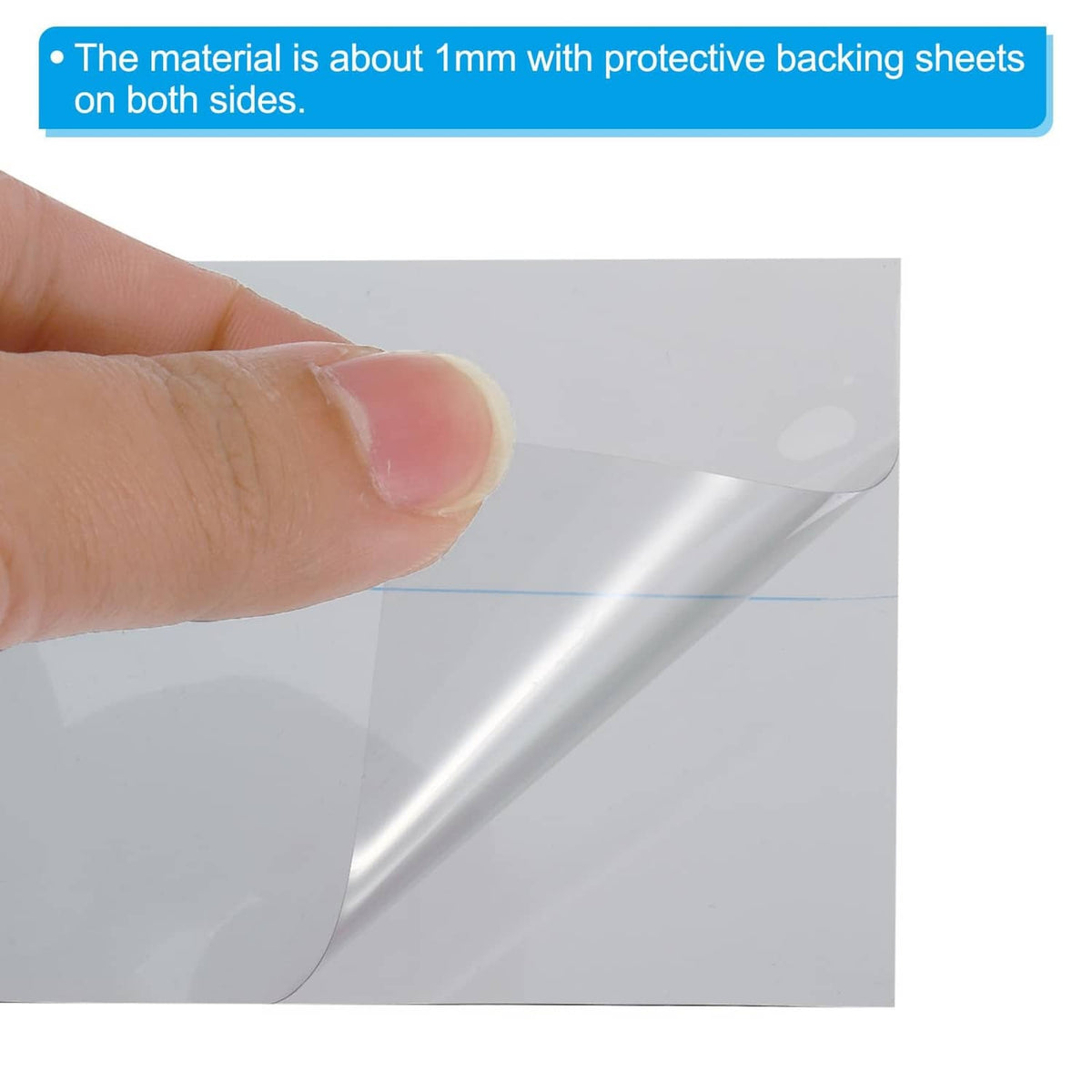 Adhesive polarizing film sheet with protective backing partially peeled, light gray