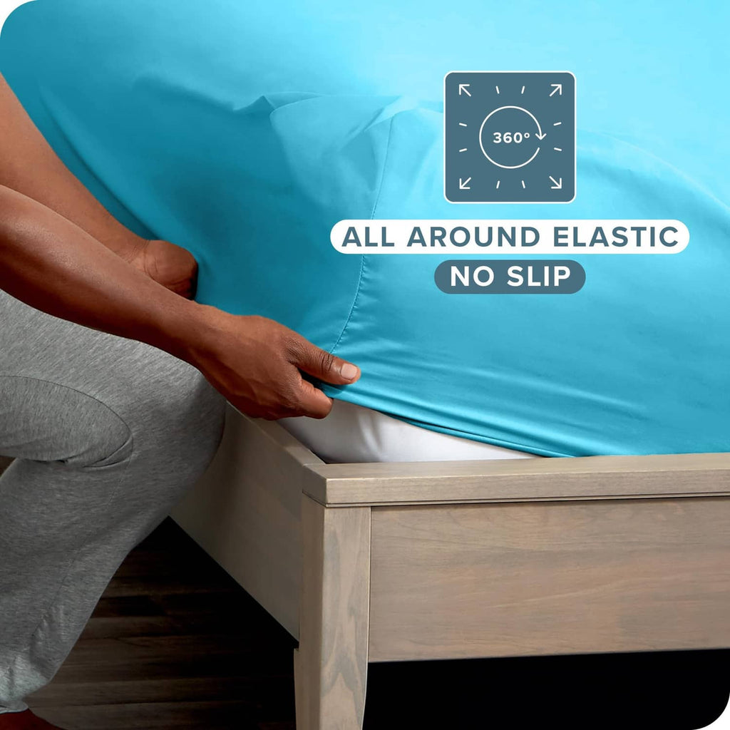 Aqua fitted sheet on mattress with all-around elastic hem, no-slip fit