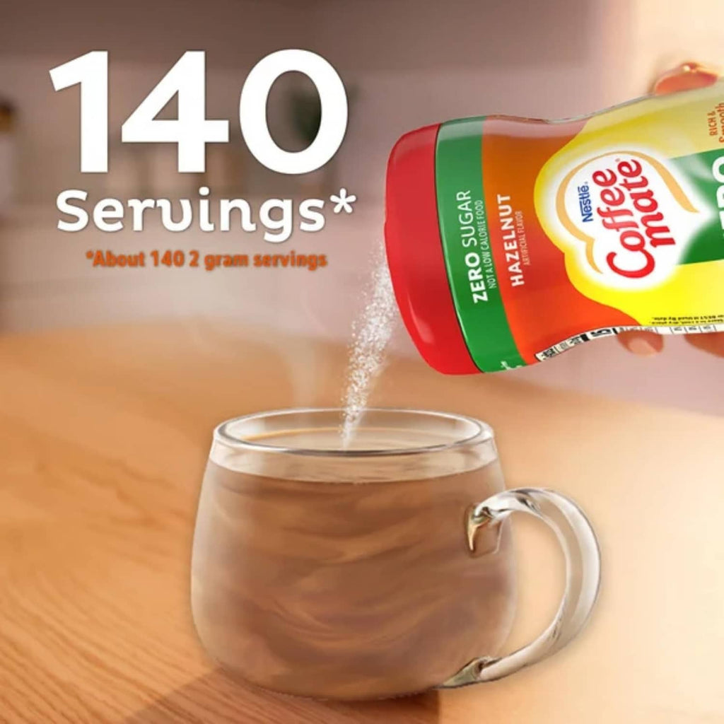 Coffee-mate Zero Sugar Hazelnut creamer bottle pouring into glass mug