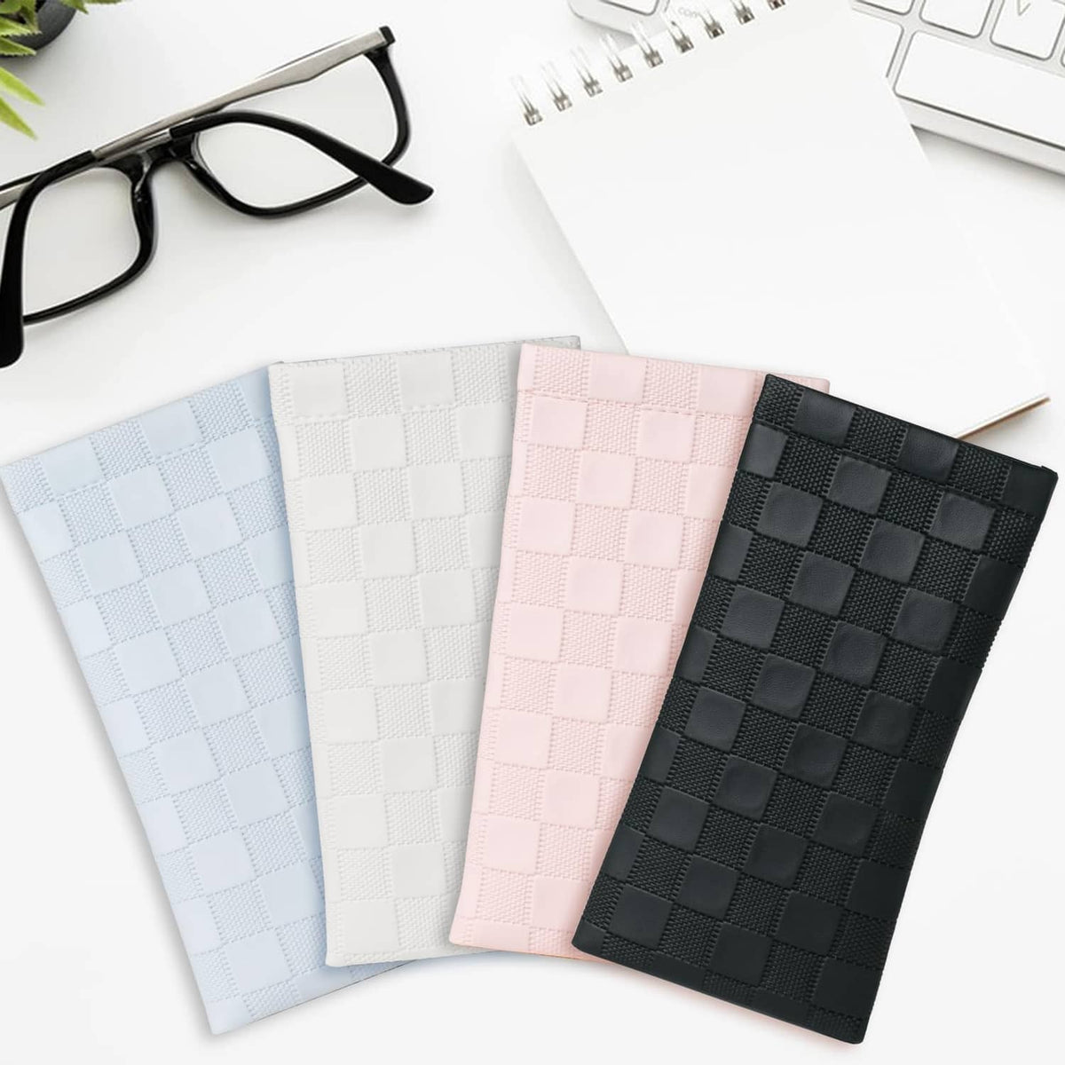 Sunglasses case set of four: light blue, white, pink, and black checkered cases