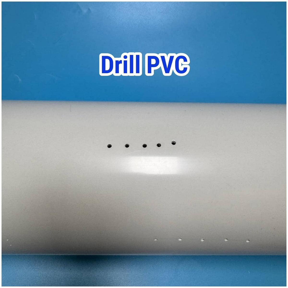 White PVC sheet with multiple small drilled holes in a dotted row