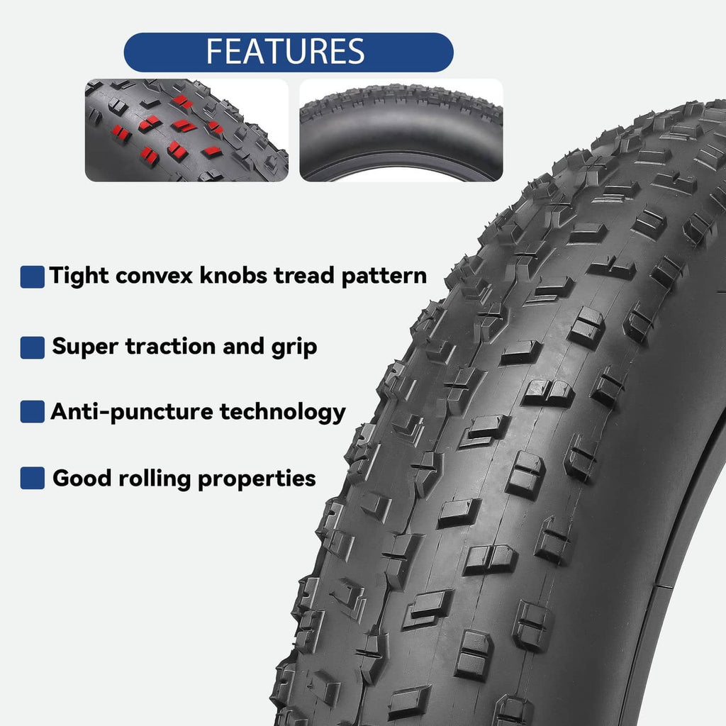 Black fat bike tire close-up with aggressive block tread pattern