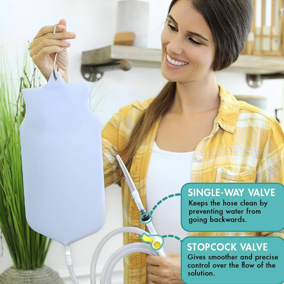 Light blue enema bag with attached hose and valve, held by a person
