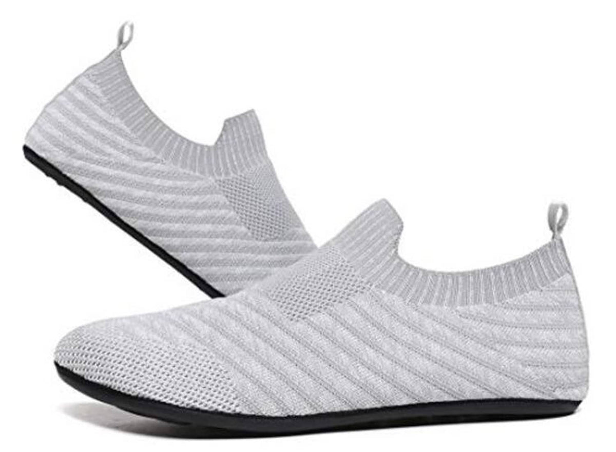 Light gray knit slip-on indoor house shoe with black bottom trim