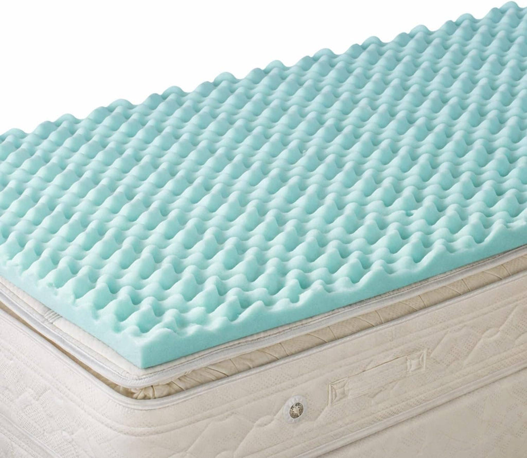 Egg crate foam mattress topper with teal raised bumps and beige side fabric edge