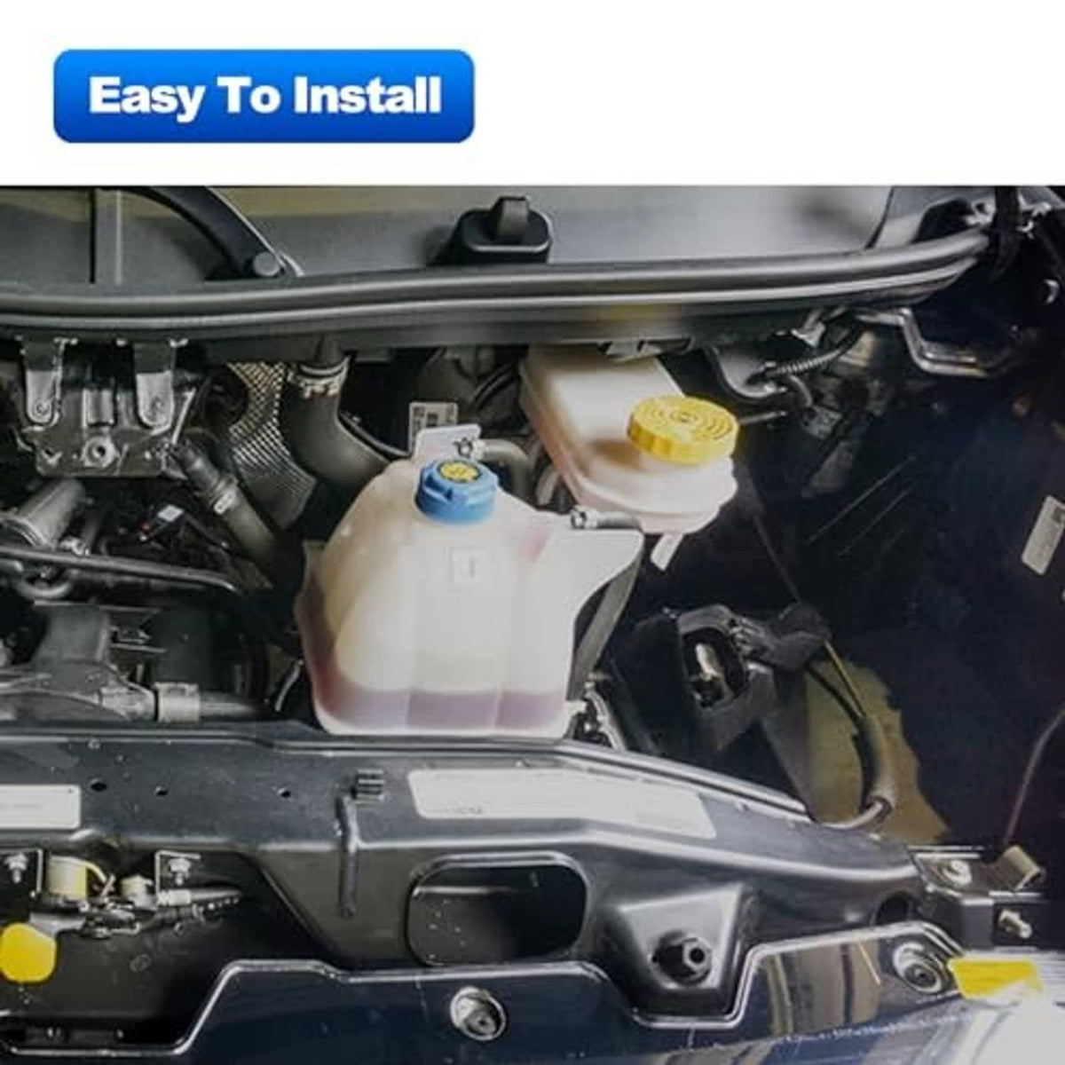 Installed white coolant reservoir tank with blue cap in the engine bay
