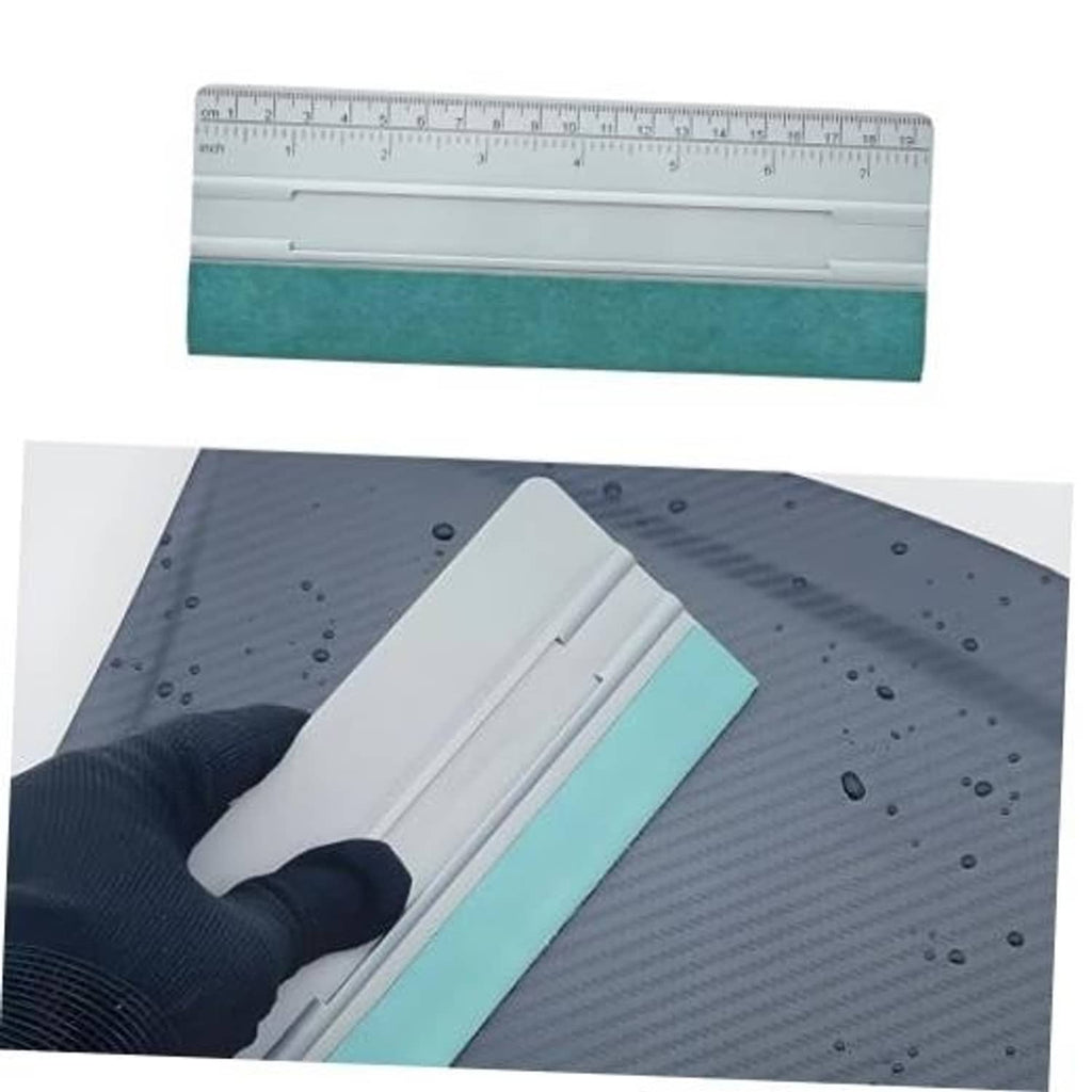 Felt squeegee applicator with teal felt edge and gray ruler scale on white body
