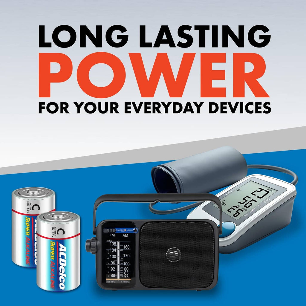 Alkaline C batteries next to digital blood pressure monitor and carrying tube.