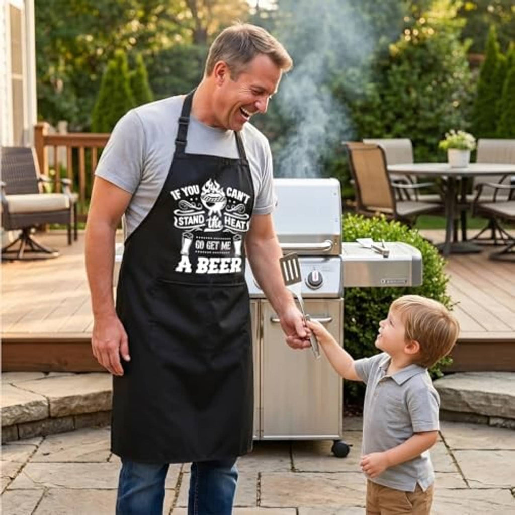 Black waterproof BBQ apron with beer graphic, dual pockets, adjustable neck strap.