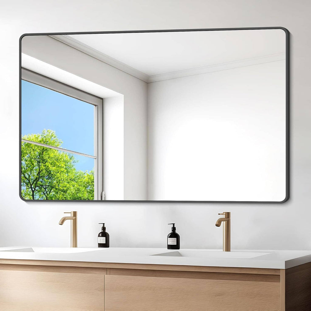 Matte black bathroom wall mirror with rounded corners and metal frame