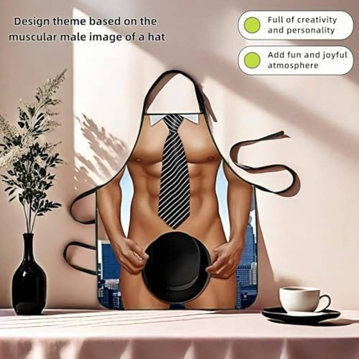 Muscle man novelty apron with striped tie and black hat graphic on chest area