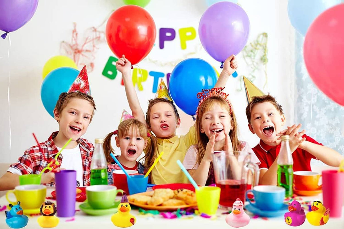 Kids party scene with assorted rubber duck toy figures on the table, colorful balloons