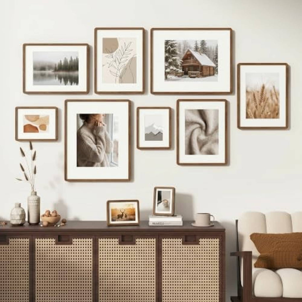 Walnut picture frames with white mats arranged in a wall gallery layout
