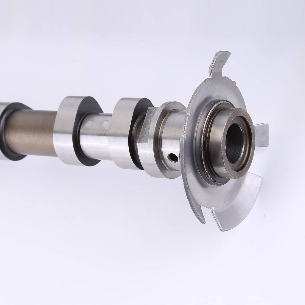 Close-up of camshaft flange end with central bearing bore and metal shaft