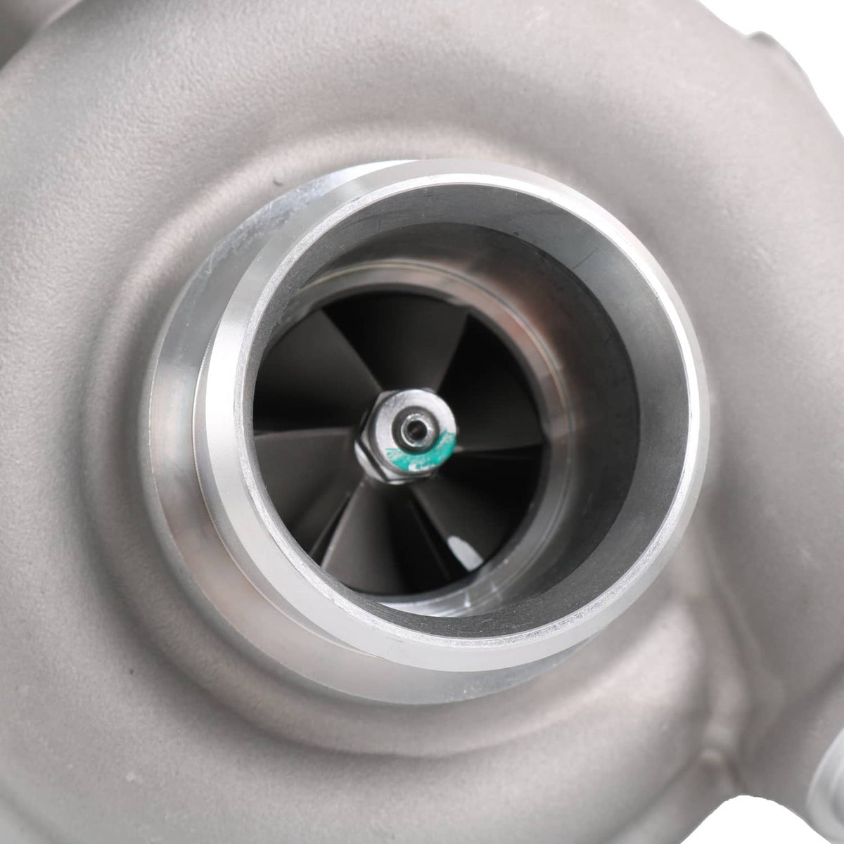 Turbocharger compressor wheel with circular inlet and metal housing