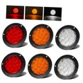 Set of 4-inch round LED trailer tail lights with red, amber, and white lenses in black housings