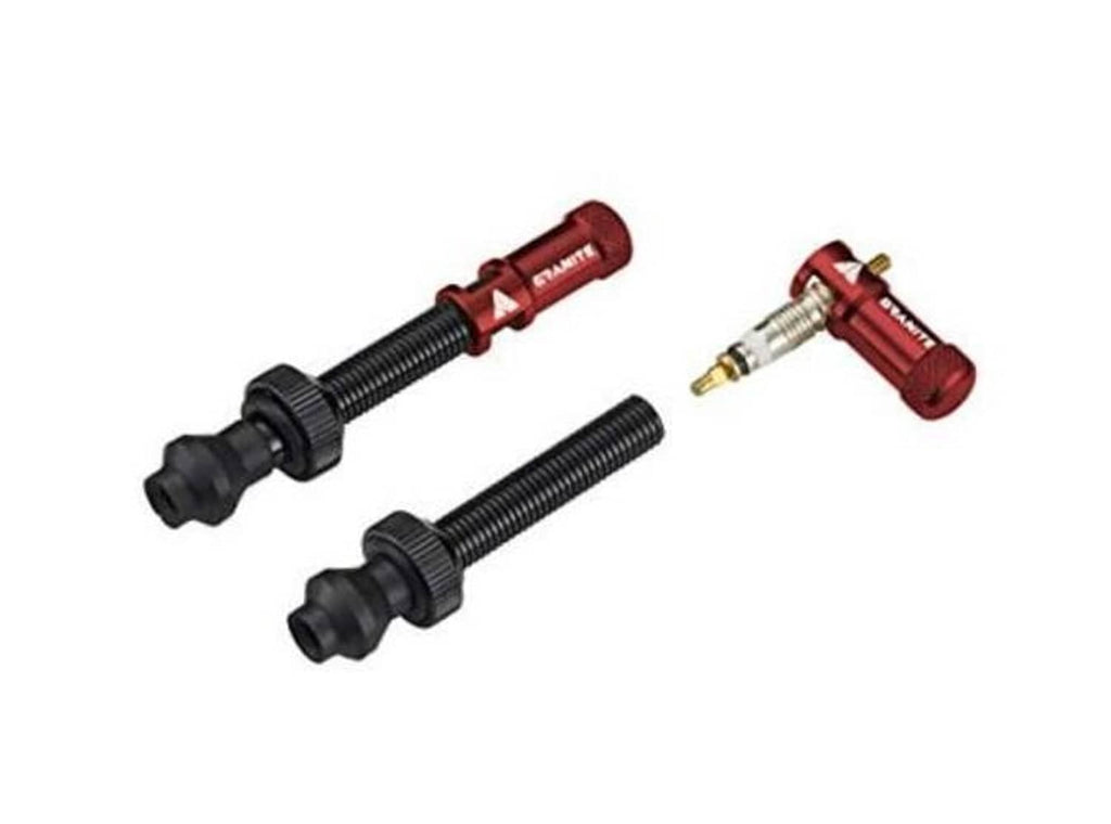 Red Presta valve cap and stem set with two threaded caps and a nozzle tool