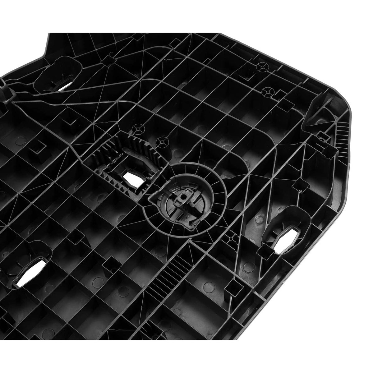 Rear cargo rack tray interior, black plastic grid with central circular opening