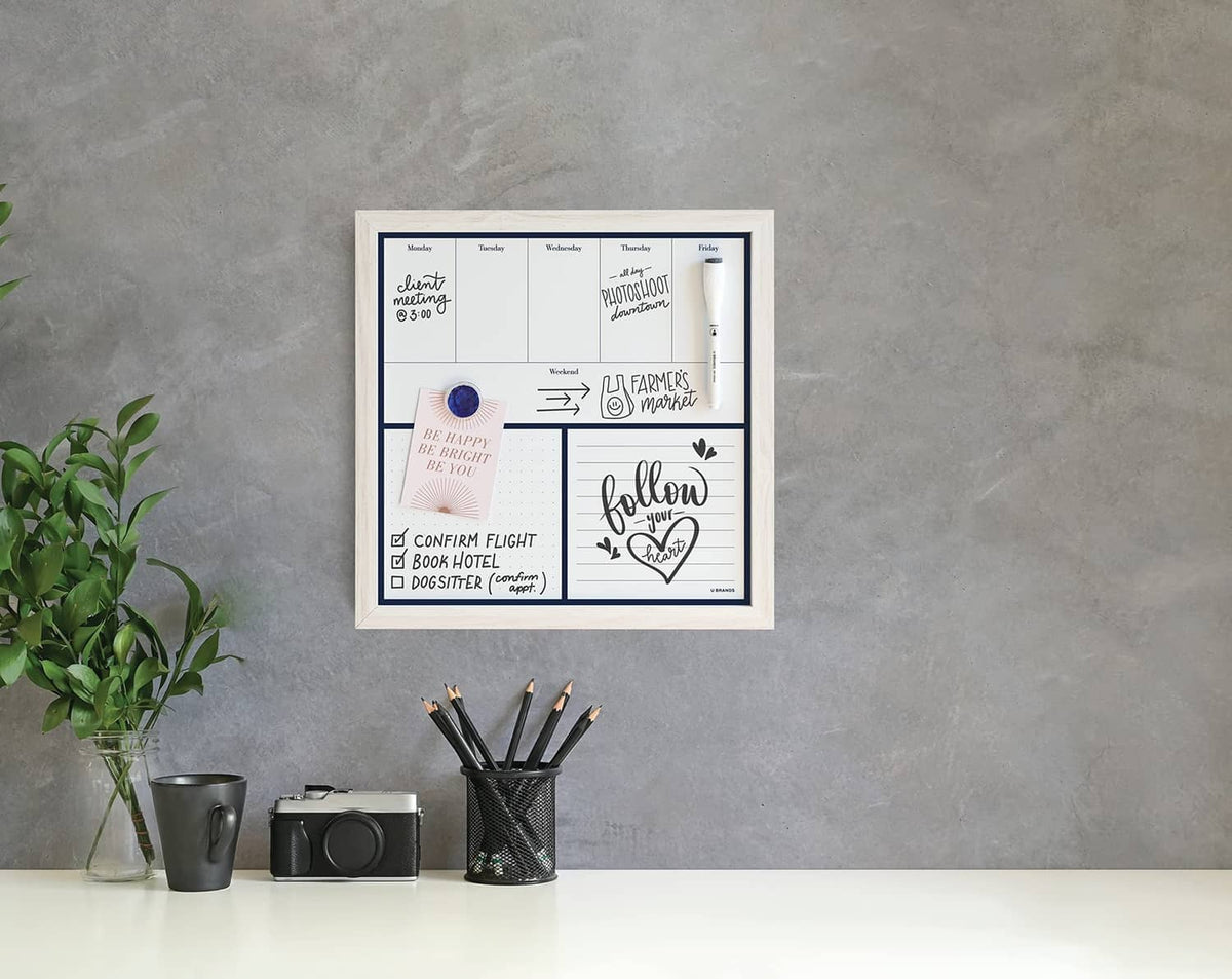 White wooden weekly dry erase board with planner blocks and checklist lines