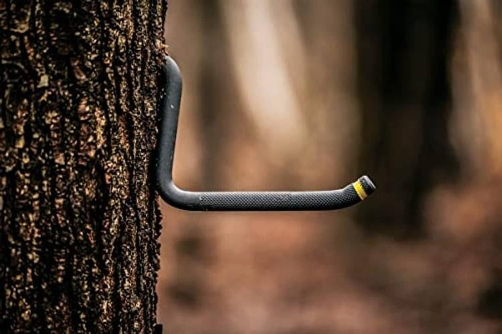 Tree step tool on bark with textured handle and yellow self-tapping screw