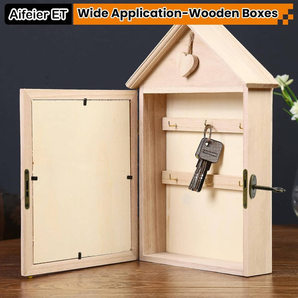Antique bronze cabinet lock on a wooden house-shaped box with skeleton key