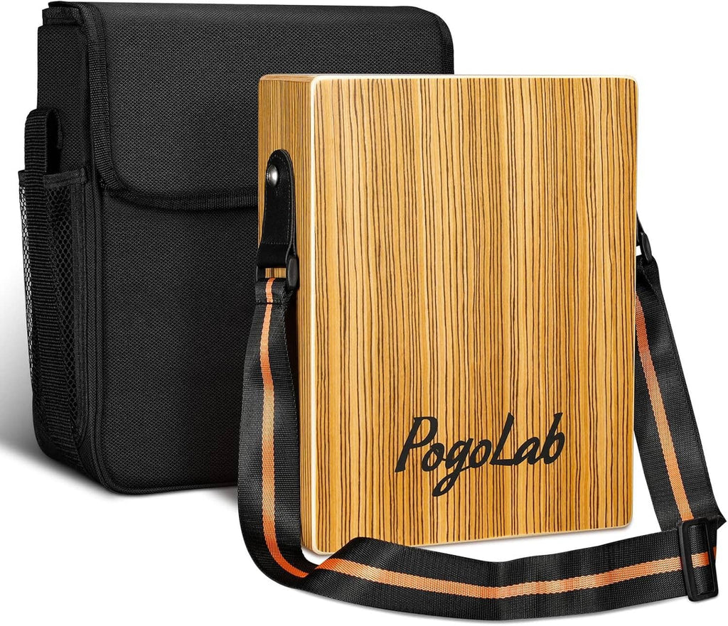 Portable wooden cajon drum in black carry case with orange-trim strap